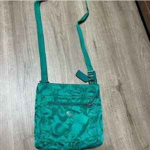 Over the shoulder coach purse